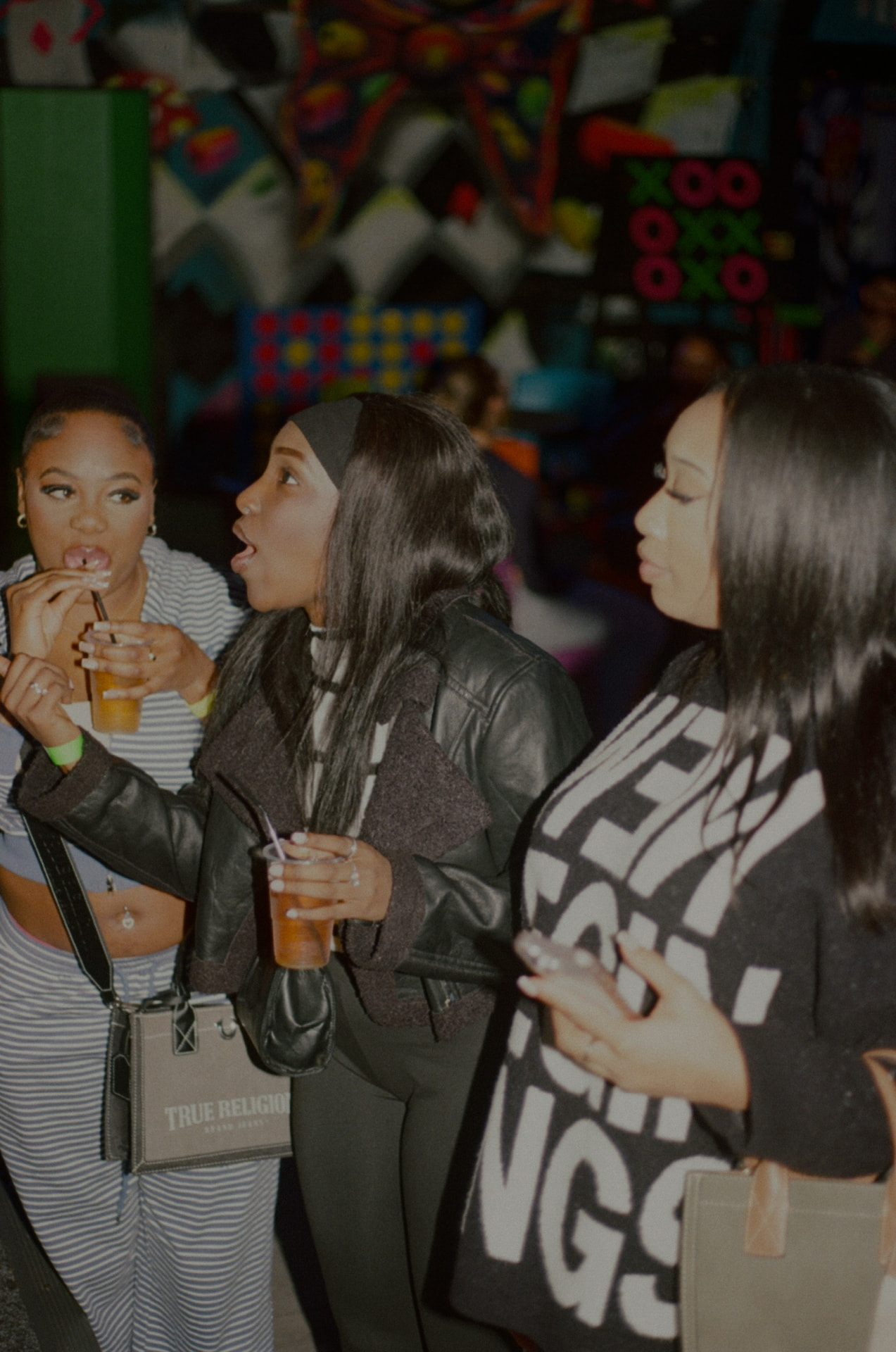 Party guests dancing after a round of HTG
